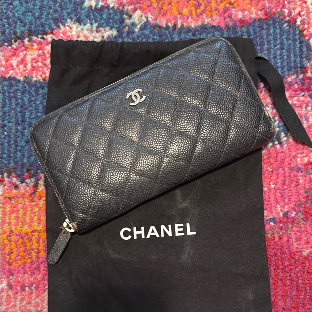 CHANEL Black Wallet with Quilted Leather and Gold Hardware